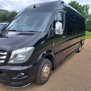 Black Mercedes Sprinter minibus